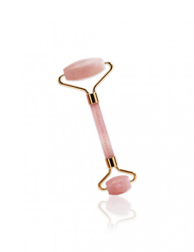 Rodillo de cuarzo rosado para masaje facial